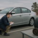 Defective vehicle parts being examined for a Massachusetts injury claim after a crash