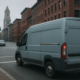 Boston commute accident workers’ compensation scene with vehicles on a city street