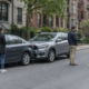 Several injured people discussing claims after a Boston crash involving one auto policy